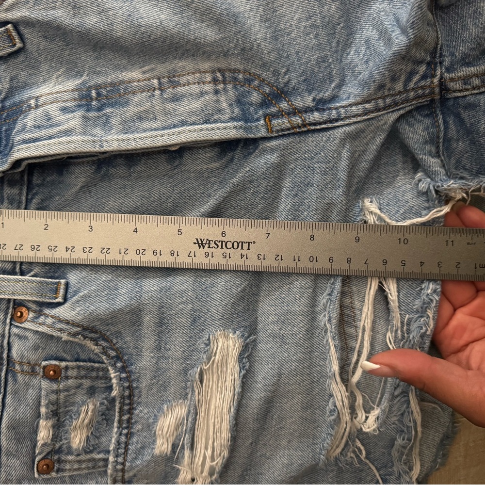 Distressed Light Blue Denim Jeans